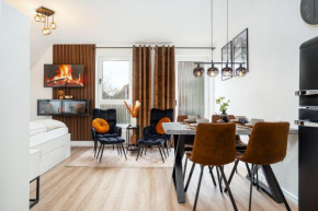 NEU! Modernes Apartment am Larrelter Tief - Balkon, Privatparkplatz & FIRE TV!